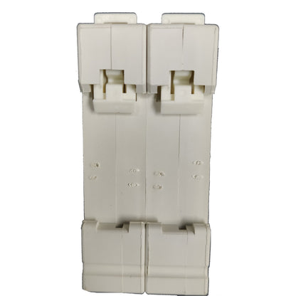 Beige plastic component on a white background