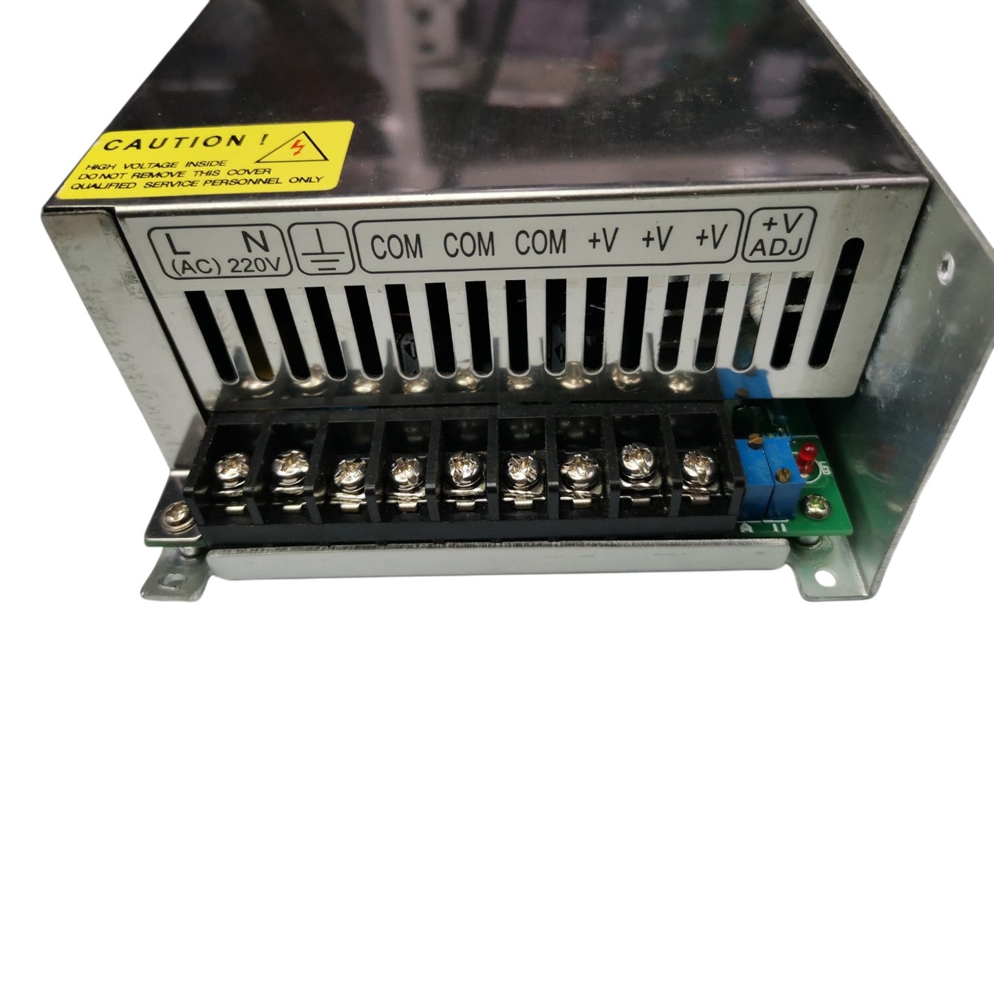 Electrical power supply unit with labeled terminals on a white background