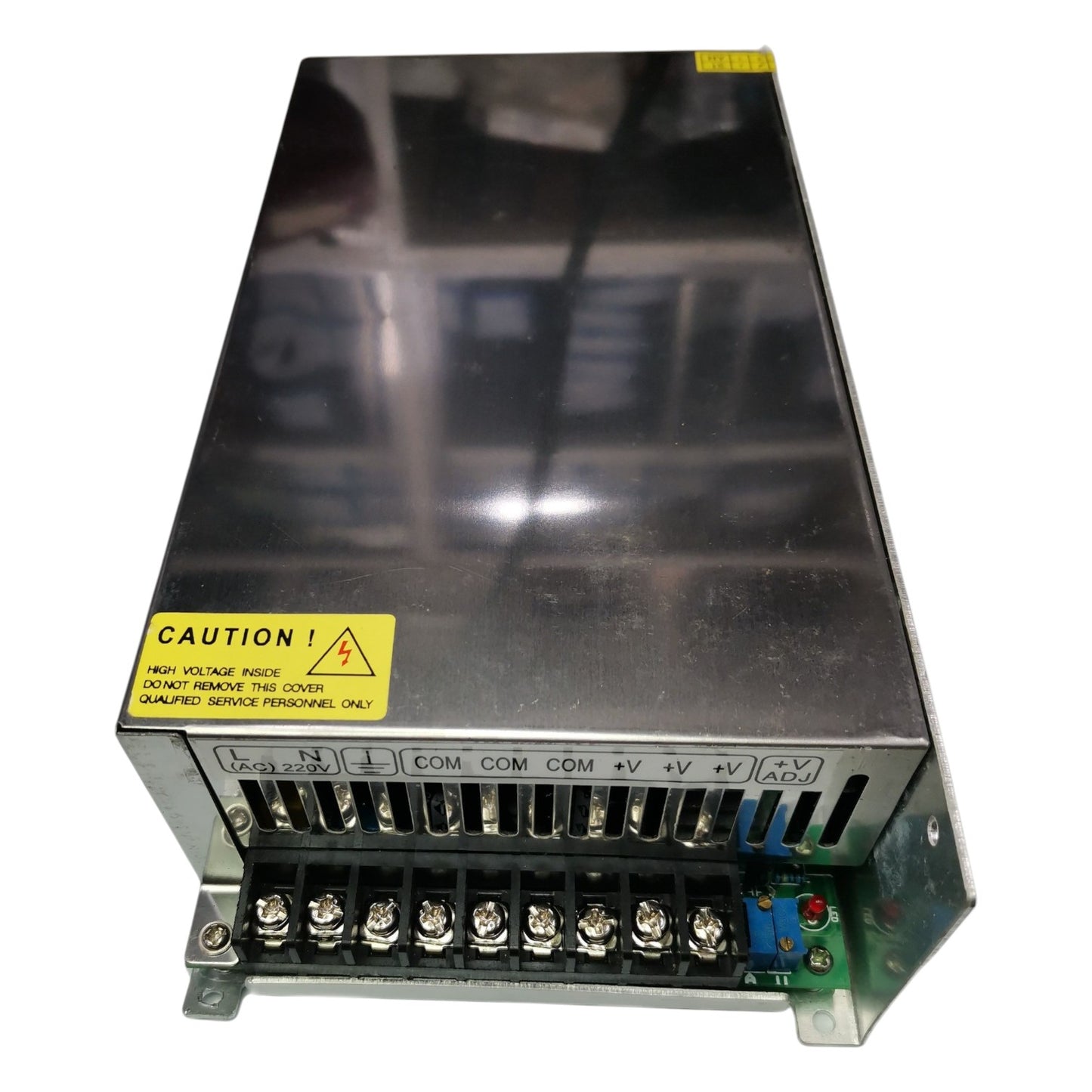 Power supply unit with warning label on a white background