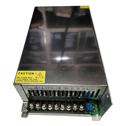 Power supply unit with warning label on a white background