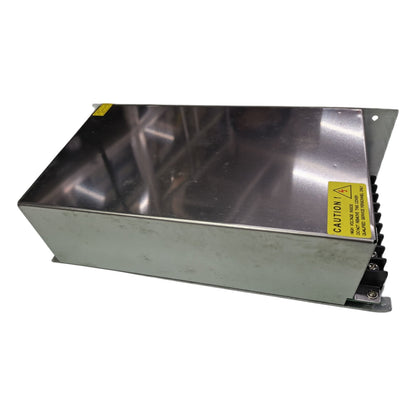 Metallic box with a warning label on a white background