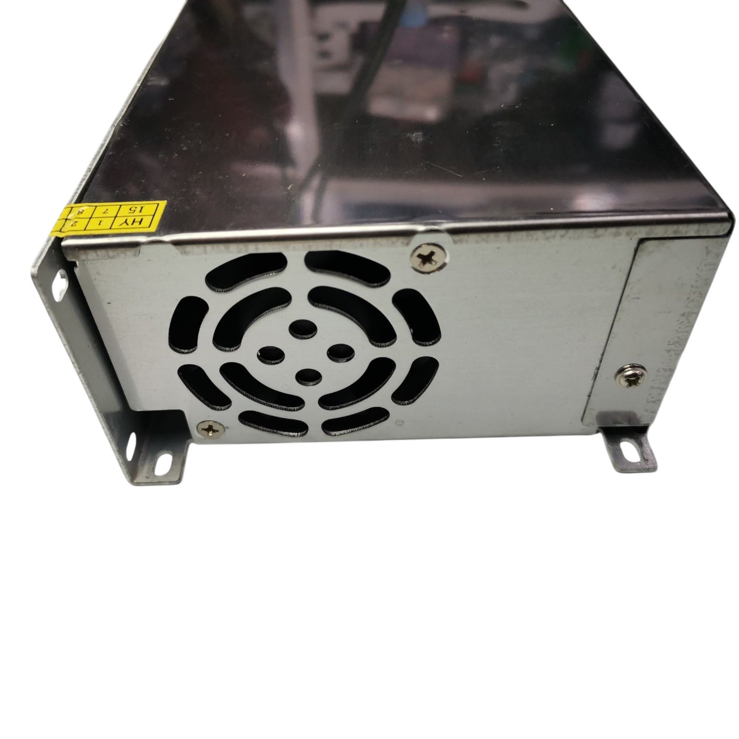 Metal power supply unit with cooling fan on a white background