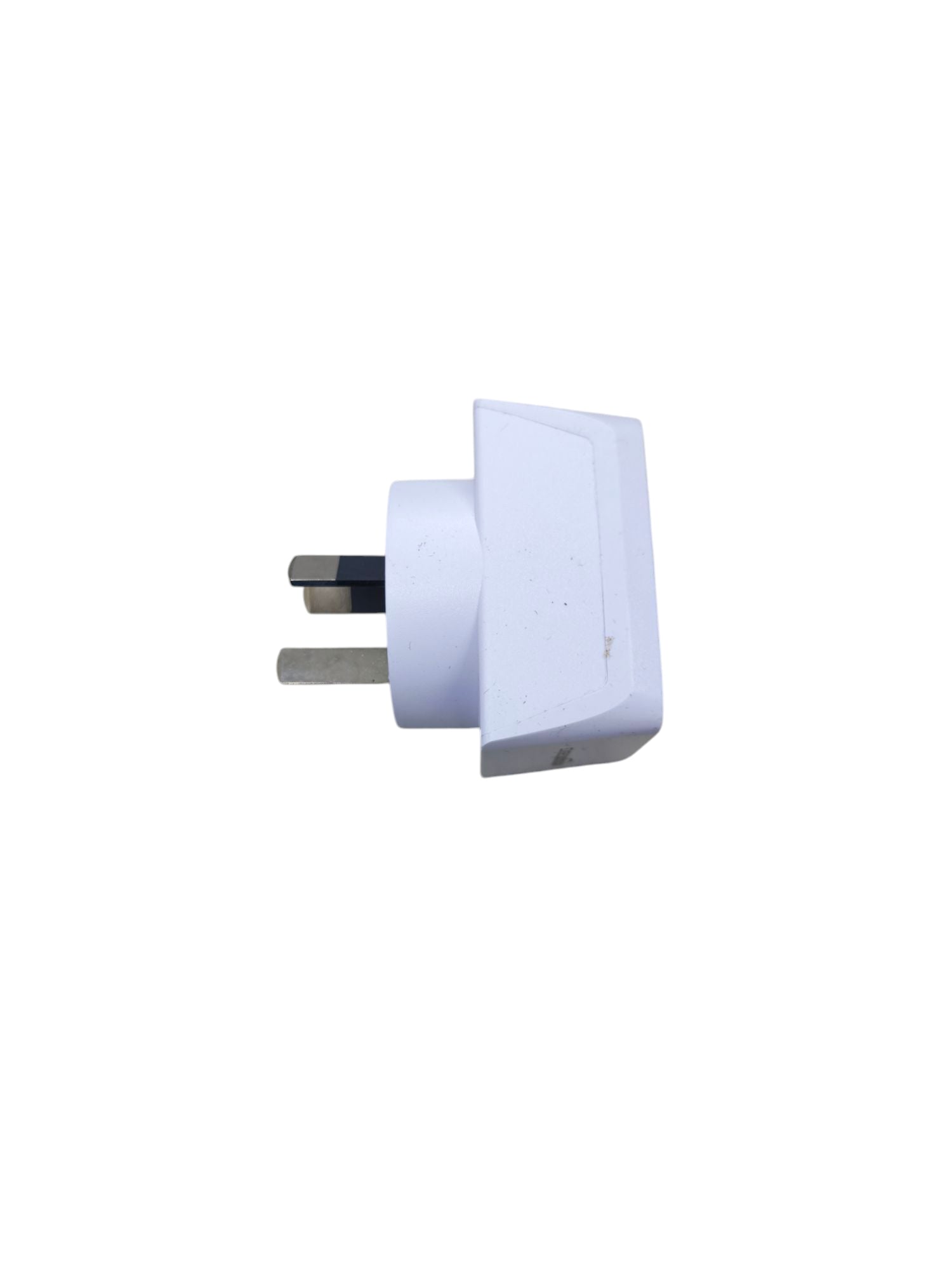 White adaptor plug with three rectangular prongs designed for electrical connections