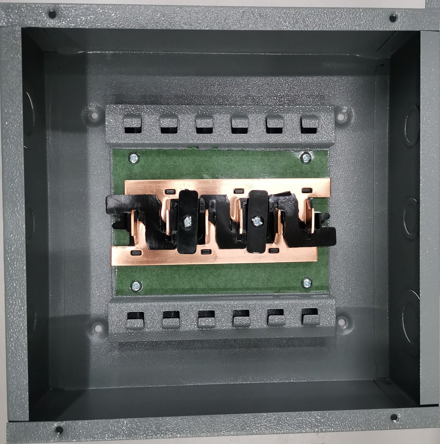 America 3x3 panel board 6 holes electrical circuitry part with metal and copper components inside gray casing
