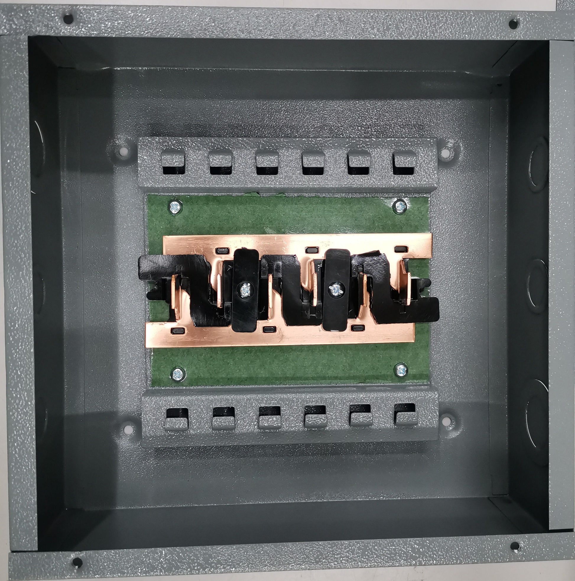 America 3x3 panel board 6 holes electrical circuitry part with metal and copper components inside gray casing