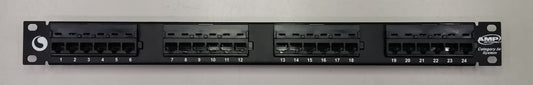 AMP CAT5E patch panel 24 port with black ports and labeled connection slots for network management