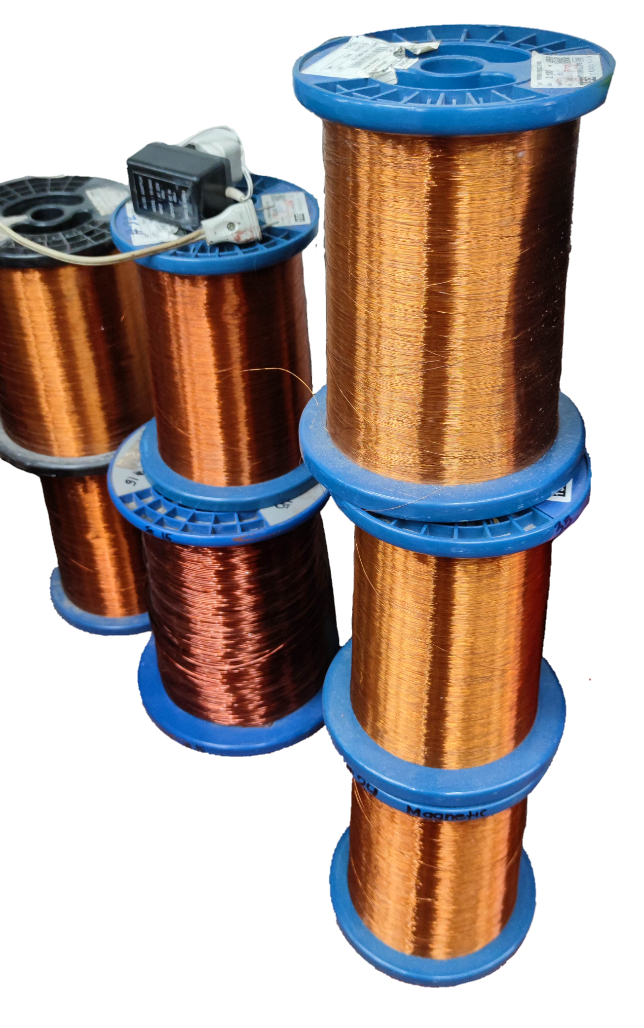 Assorted Philflex spools of AWG 9 to AWG 32 magnet wire in various colors for electrical applications