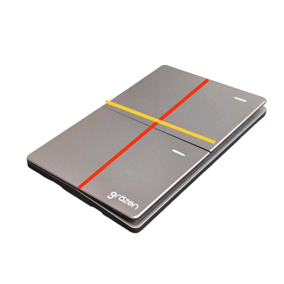 A gray rectangular electronic device with rounded corners, featuring a red diagonal line, a yellow horizontal line, and small green indicator lights. The brand name 'grtzen' is printed in white near the bottom left corner.