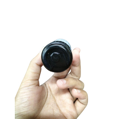 BMI Starting Capacitor 21-25MFD 330V held in hand, ideal for motor parts and electrical applications