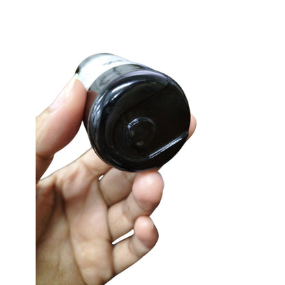 BMI Starting capacitor 250-300UF 165V held in hand, ideal for motor applications.