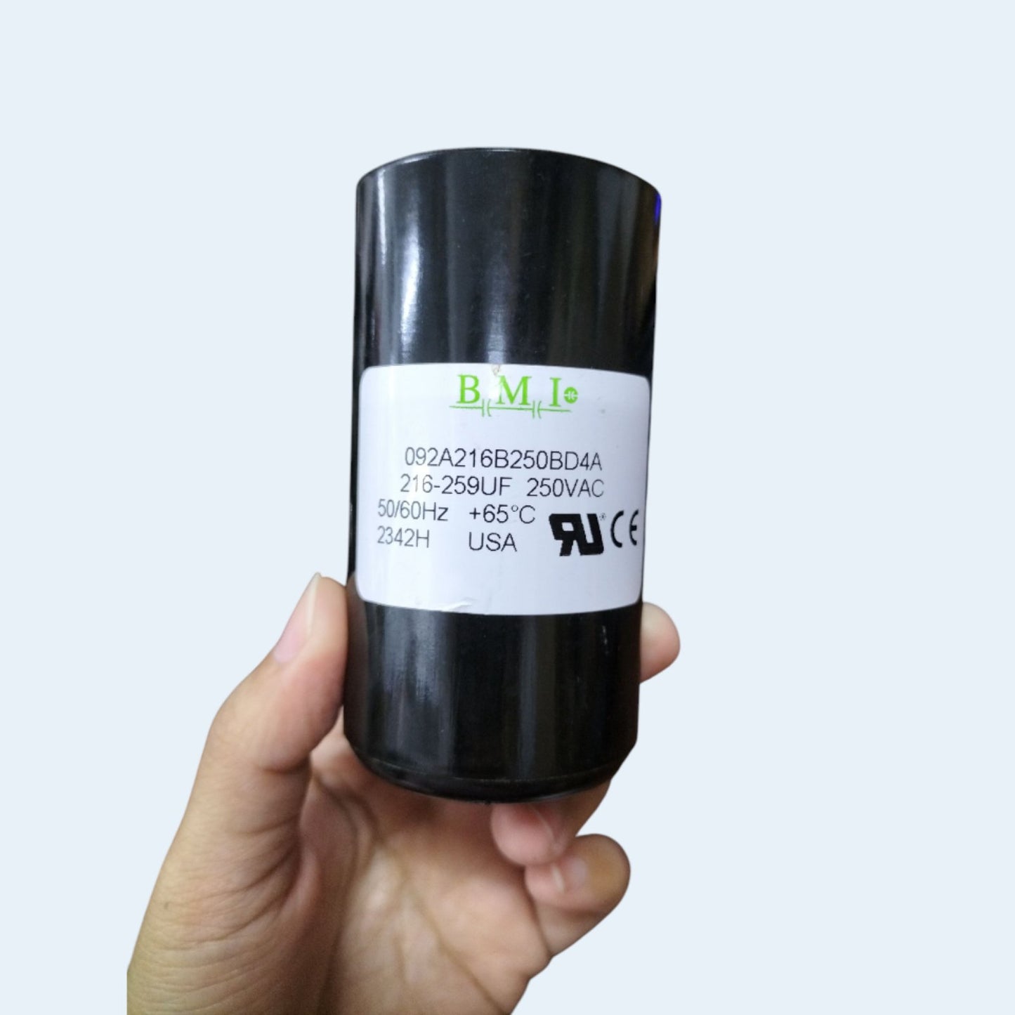 BMI 216-259MFD AC capacitor 250V with a durable black casing for electrical applications