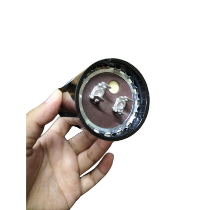 BMI starting capacitor 161-193UF 250V AC with terminal connections displayed in hand