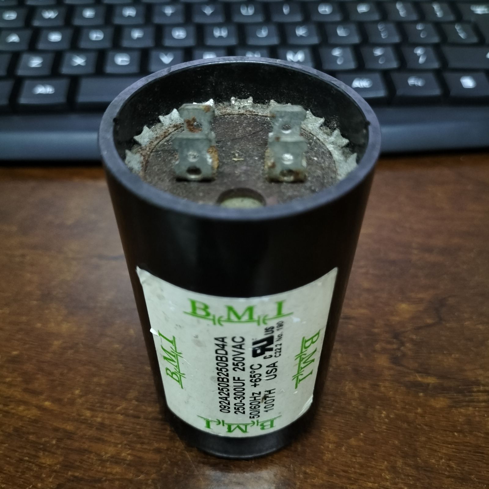 BMI 250-300uF Starting Capacitor for electrical circuits, featuring durable design and multiple connectors