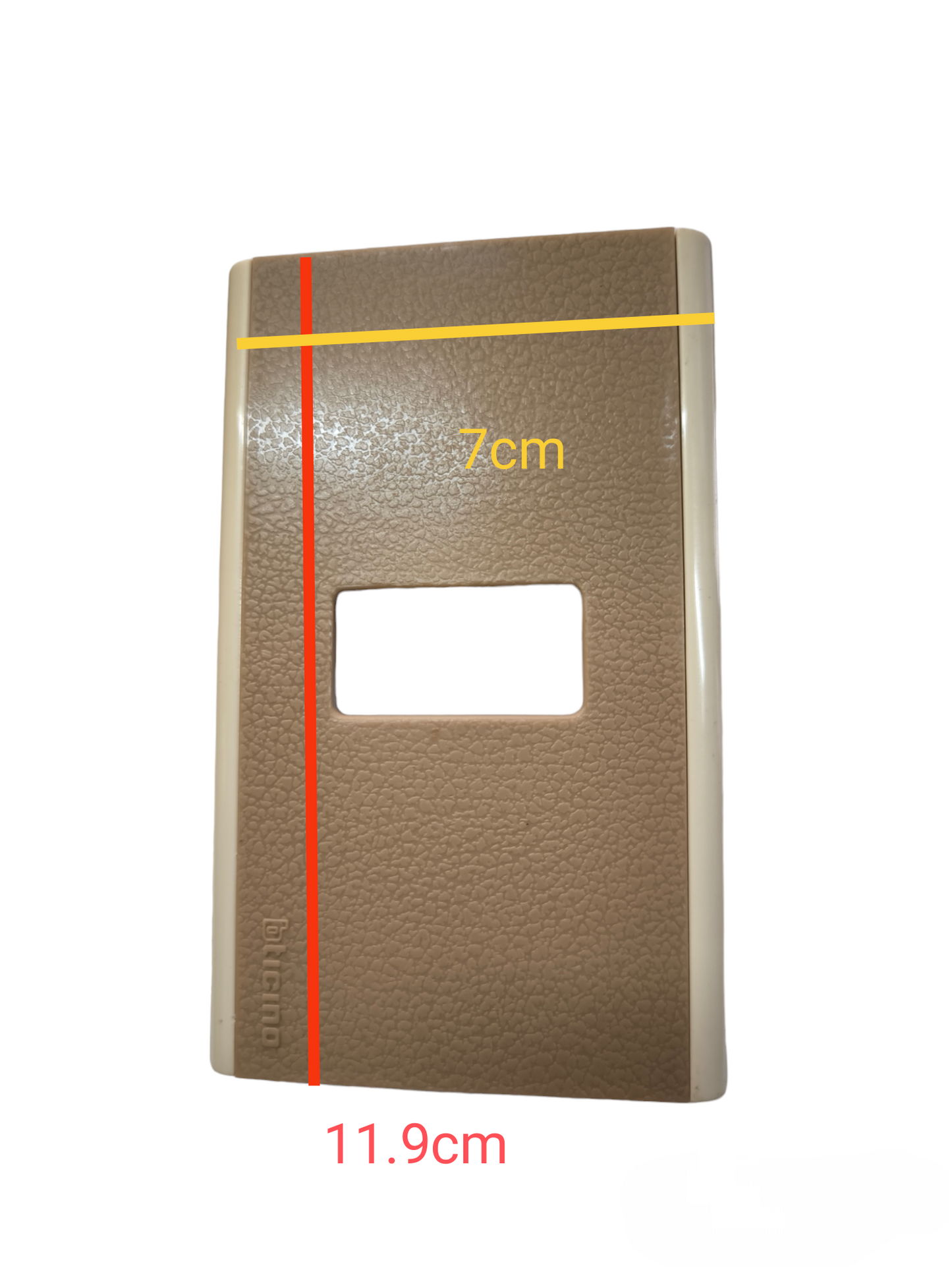 Bticino switch plate cover in brown textured finish with rectangular opening and beige edges
