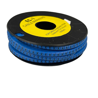 Grippes Cable Marker Blue - K on a spool for organizing wires and cables in any workspace
