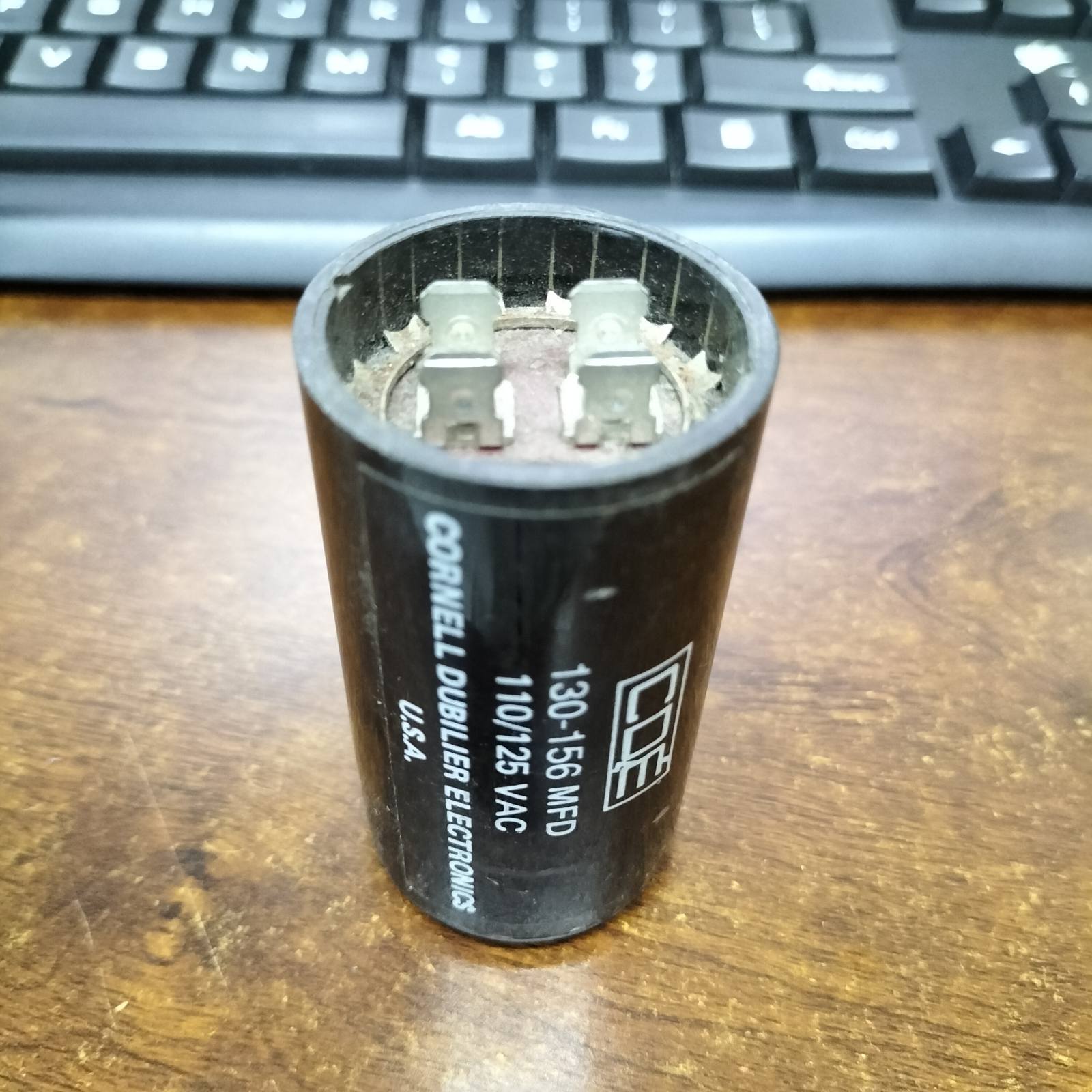 CDE electrical capacitor 110-125V with dual terminals for efficient electronic applications