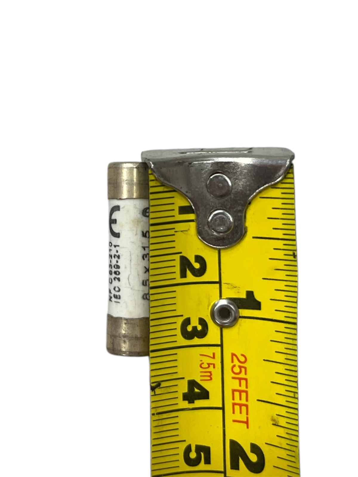 Ceramic Fuse 12A 400V 8x31mm next to yellow measuring tape showing size