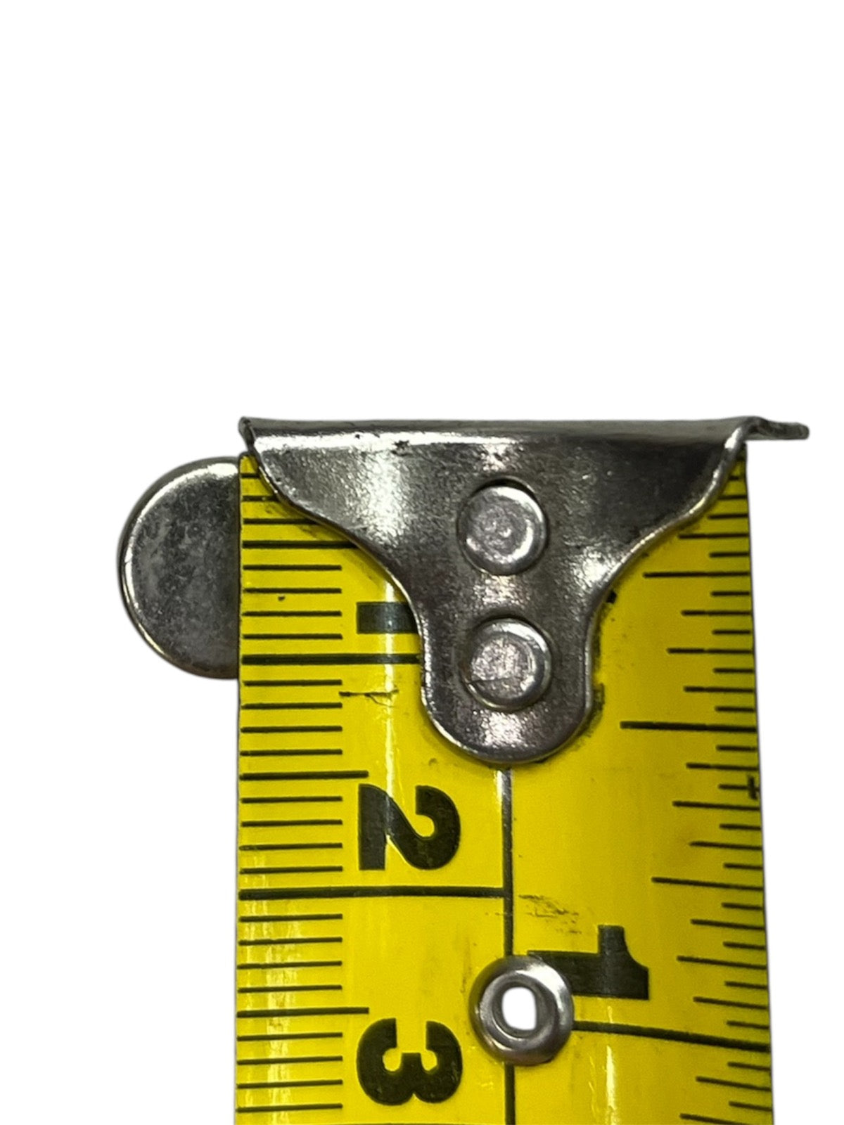 Close-up of metal electrical clip on yellow measuring tape for Ceramic Fuse 6A 500V 10x38mm