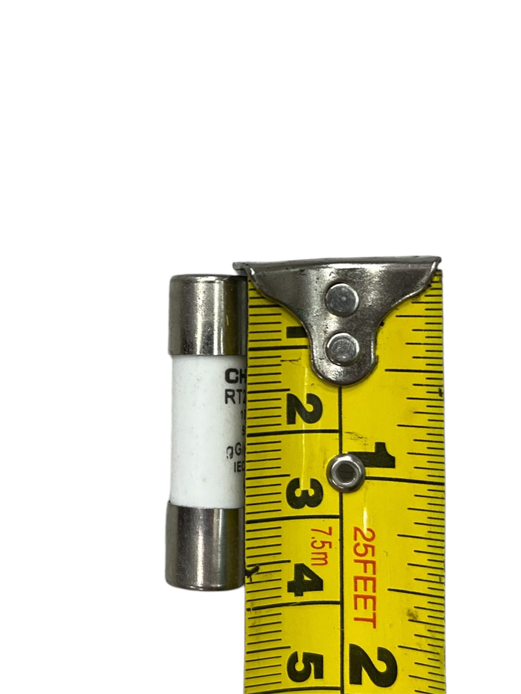 Ceramic Fuse 6A 500V 10x38mm next to yellow measuring tape showing its size