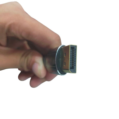 Close-up of a hand holding a display port cable 1 meter for connecting monitors and devices