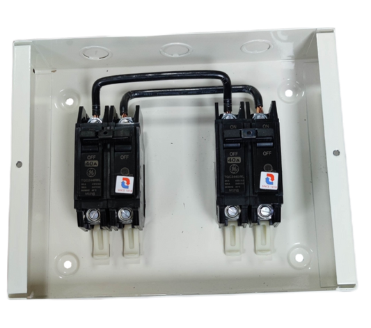 GE and Koten double pole double throw breaker installed in a white electrical panel for circuit protection