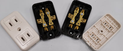 Eagle CAT2082 outlet adapter power points with open and closed white plastic casing showing internal brass connectors