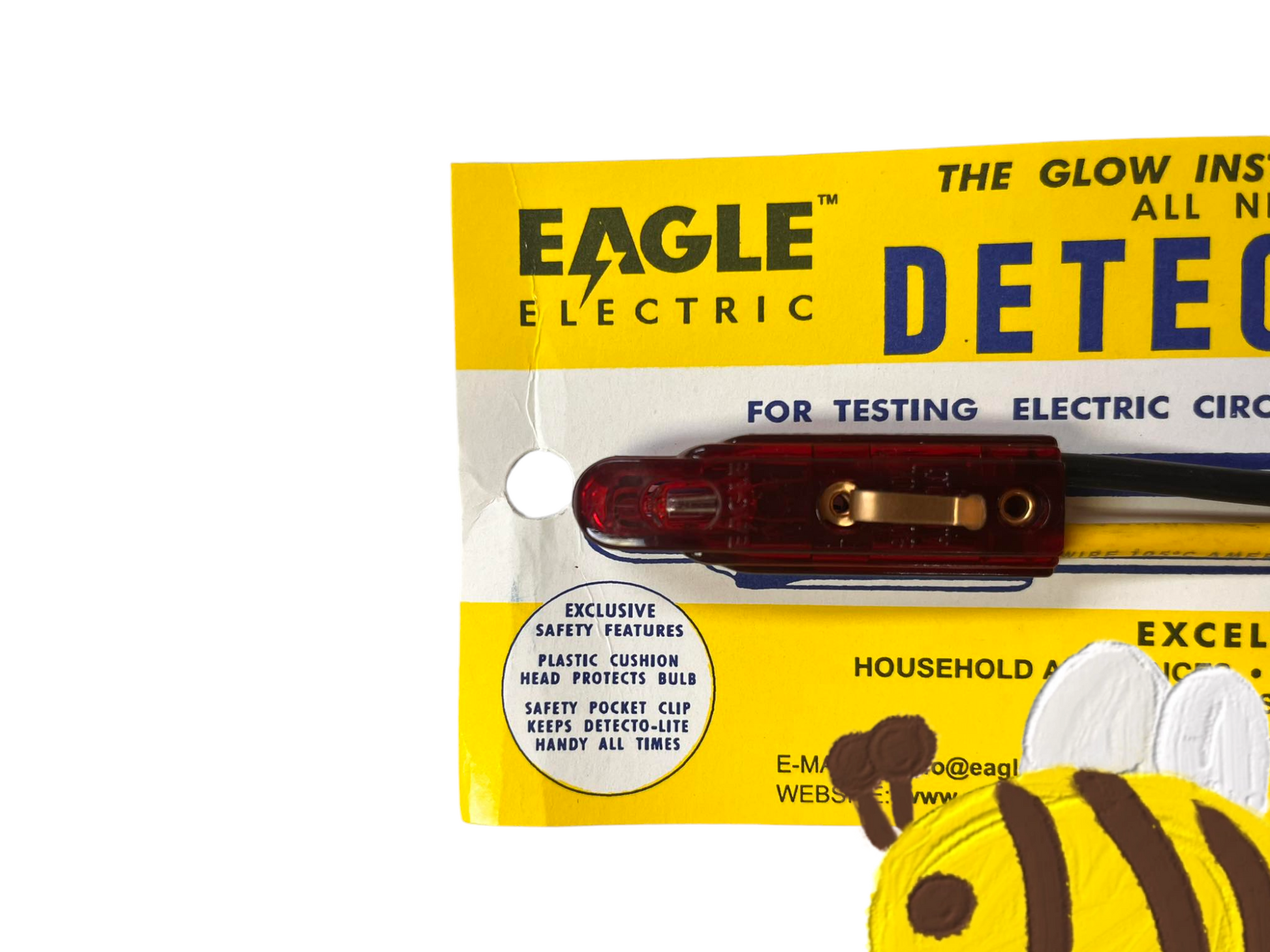 Eagle Detecto-Lite test light with protective red bulb and pocket clip on yellow packaging