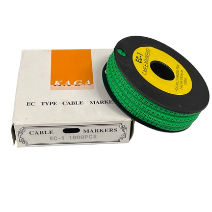Grippes Cable Marker 7 Green spool of EC type cable markers on black reel next to box