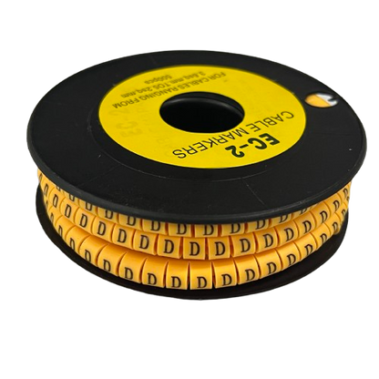 Grippes spool of Cable Marker D - Yellow printed D cable markers on a black reel for wire identification