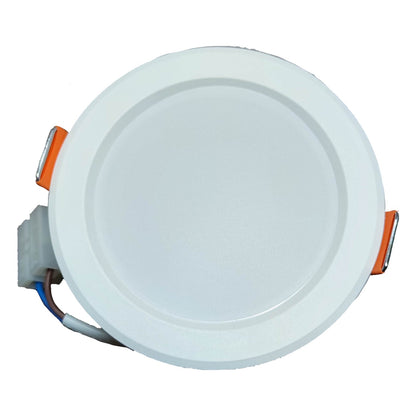 Round LED downlight with white casing on a white background