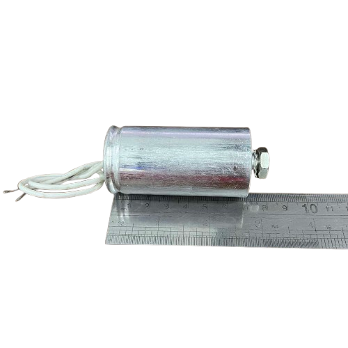 Firefly 70W metal halide capacitor 12uf in silver casing with wire connections and measuring ruler