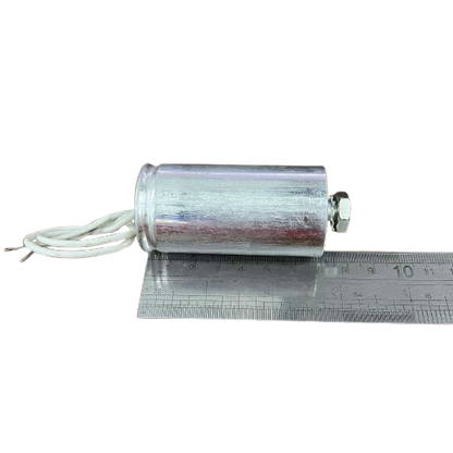 Firefly 70W metal halide capacitor 12uf in silver casing with wire connections and measuring ruler