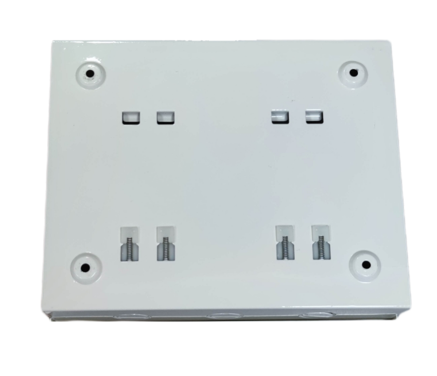 White GE Koten electrical switchgear panel with mounting holes and connection terminals