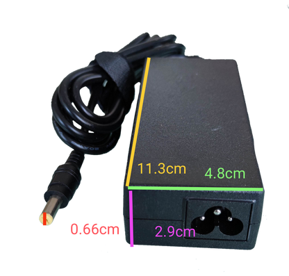 Sony laptop power supply with black rectangular adapter and attached cable on black background