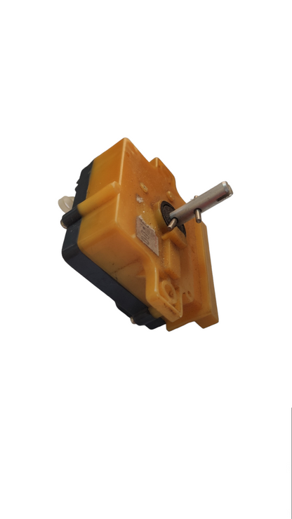 Yellow and black washing machine timer part with metal shaft for laundry appliance repair