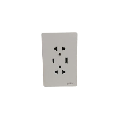 A white wall outlet cover plate featuring a USB-C port and a standard US outlet, branded 'grdain' in the bottom right corner, shown on a plain white background.