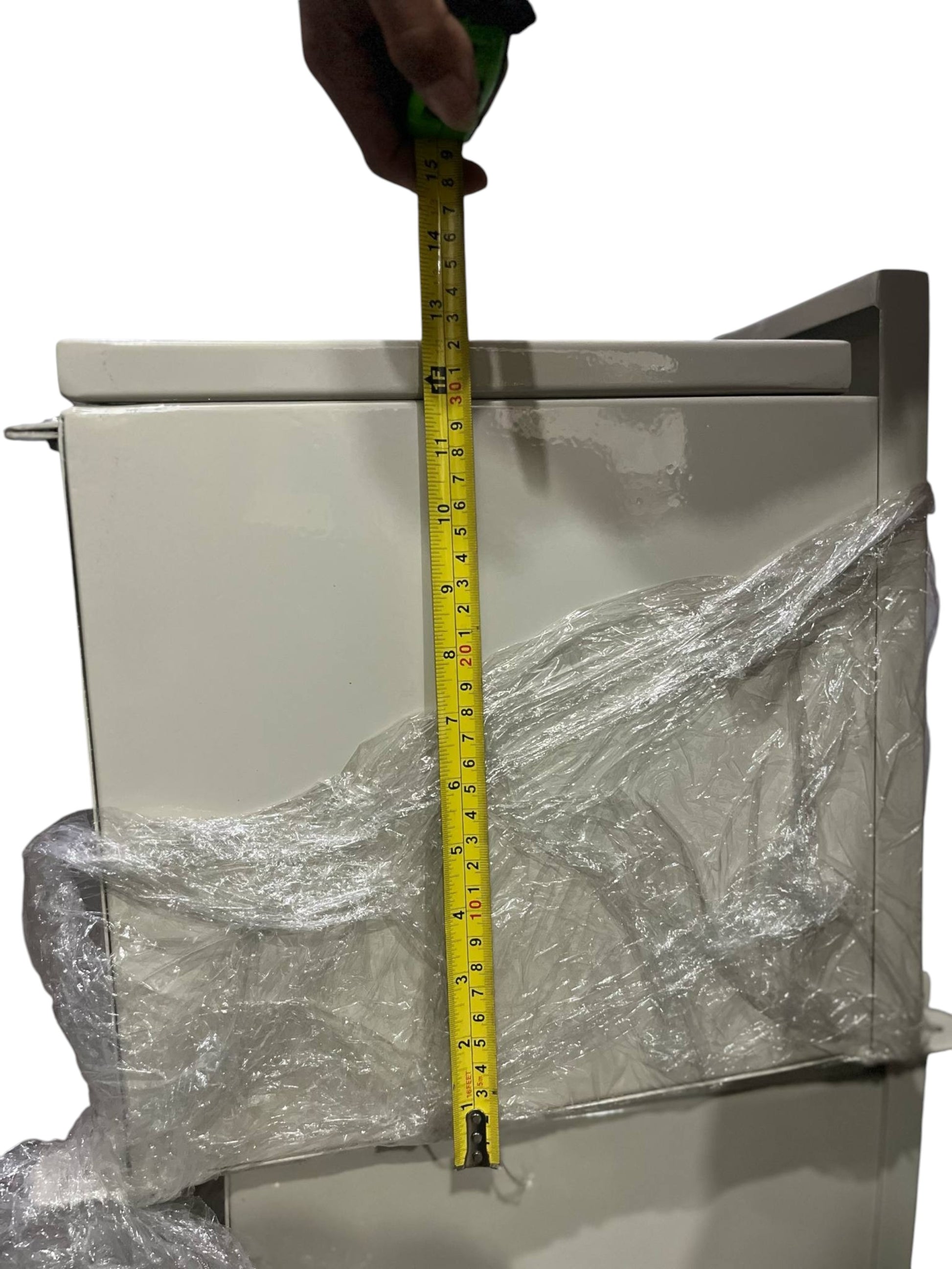 Local panel board with a measuring tape showing dimensions for Gutter 2400mm x 350mm x 300mm