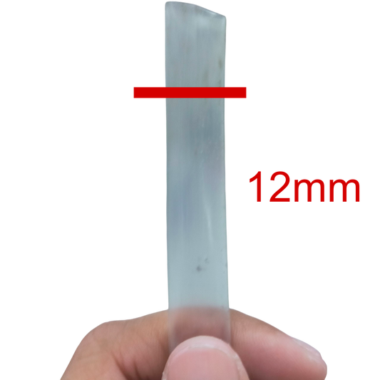 Hand holding a 12mm Heat Shrinkable Tube Clear for cable management from China