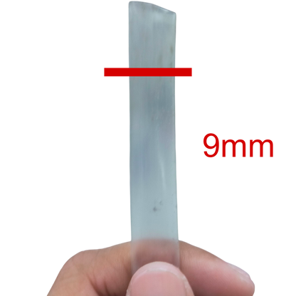 Hand holding a 9mm Heat Shrinkable Tube Clear for cable management from China
