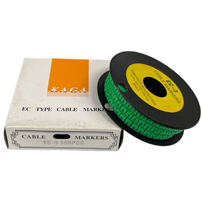 Spool of Cable Marker 1 Green labels on black reel next to KAGA EC type cable markers box for cable management