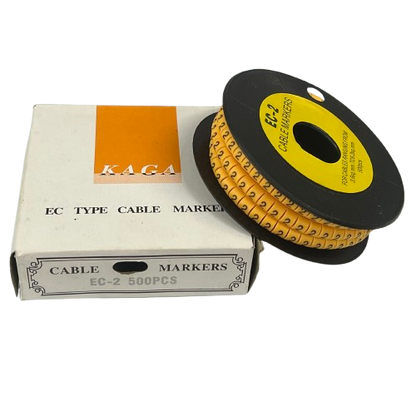 Spool of yellow numeric cable marker rings next to box for wiring Cable Marker - 2 Yellow