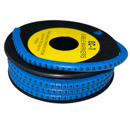 Cable Marker 3 Blue vinyl numbered markers on black spool for cable identification and organization