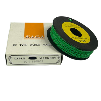 Spool of green letter B cable markers on a black reel next to white box for cable management Cable Marker - B Green