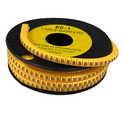 Cable Marker - B Yellow reel of adhesive cable labels on black spool for cable management and identification