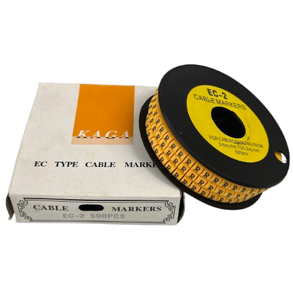 Grippes Cable Marker R - Yellow reel of printed R cable markers on black spool with box