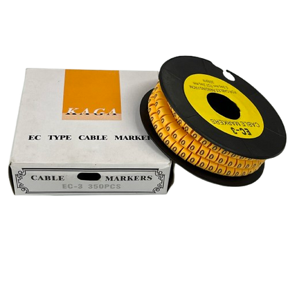 Cable Marker Yellow 0 spool of yellow numeric cable sleeves on black reel beside white KAGA box for cable management