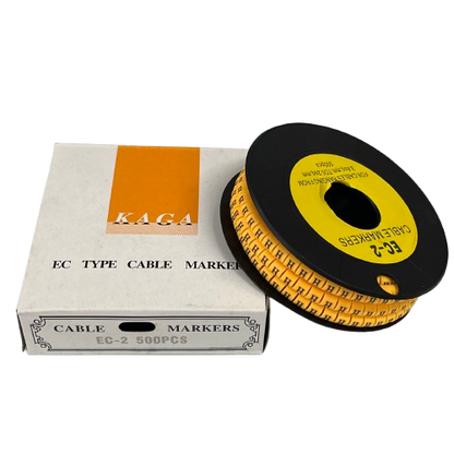 Grippes Cable Marker - Yellow 8 spool of printed cable labels on black reel beside white storage box