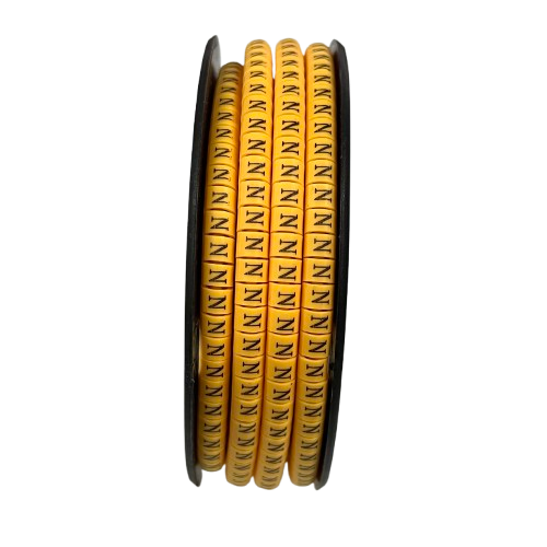 Coiled yellow cable management strip with multiple N Marker 2.6mm to 4.2mm labels on black spool