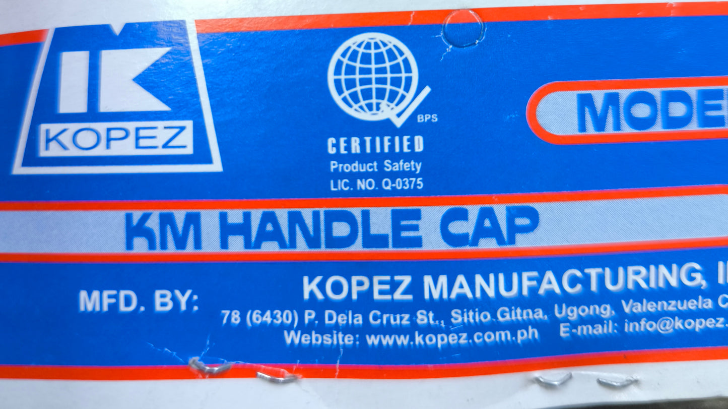 Kopez 2A 220V electrical plug packaging label showing product safety certification and manufacturer details