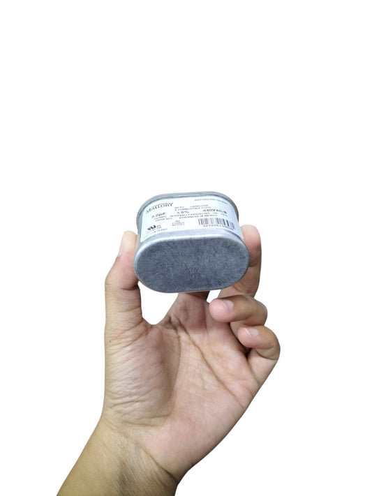 Mallory 3UF 440V oil-filled capacitor held in hand, compact design with detailed label